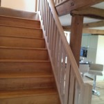 Pine staircase with oak string, base cap and handrail